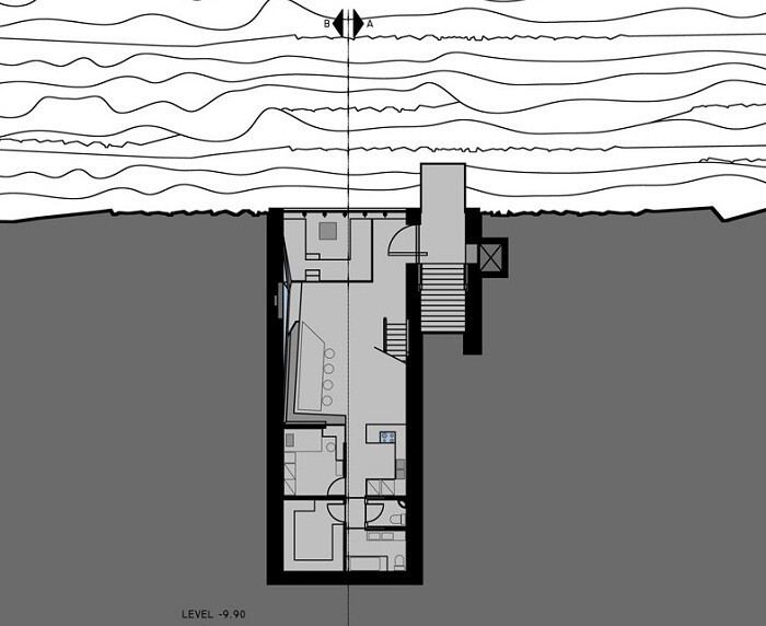 Смелый концепт дома в скале с бассейном на крыше