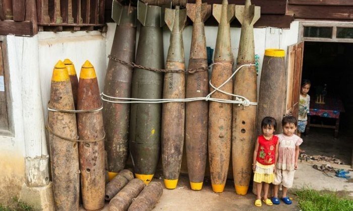  Лаосские неразорвавшиеся бомбы в быту жителей Лаоса