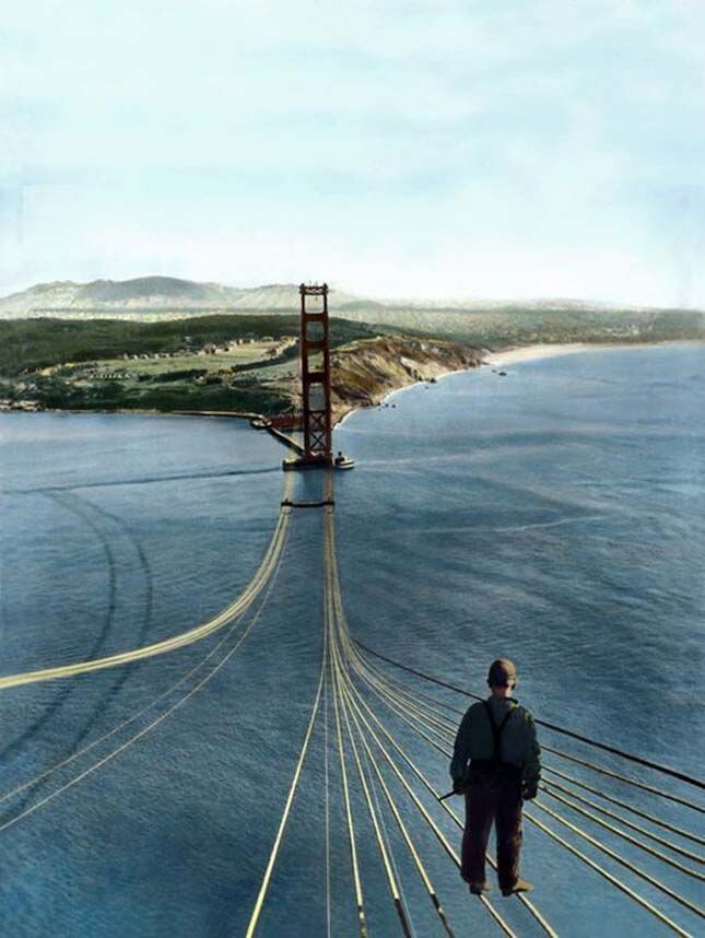 Рабочий, стоящий на недостроенном мосту "Золотые Ворота", Сан-Франциско, 1935 год