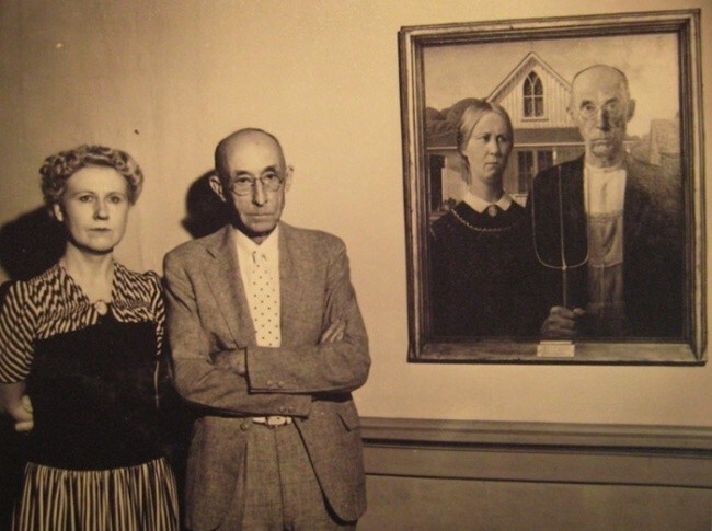 Герои картины «Американская готика» художника Гранта Вуд, 1930 год