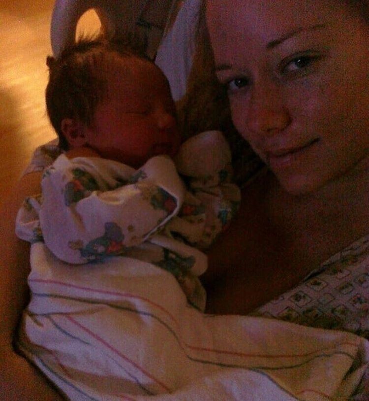 С новорожденным сыном, 2009 г.