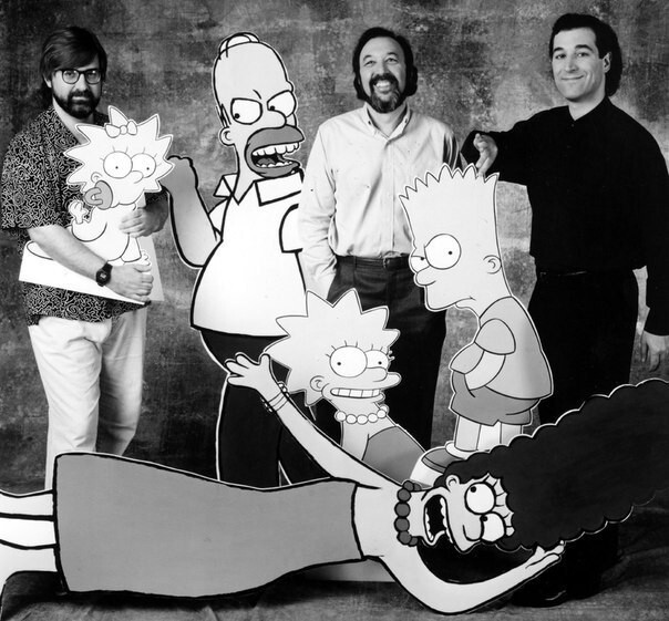 Создатели сериала "Симпсоны" Мэтт Гроунинг, Джеймс Брукс и Сэм Саймон вместе с героями мультика, 1990 год