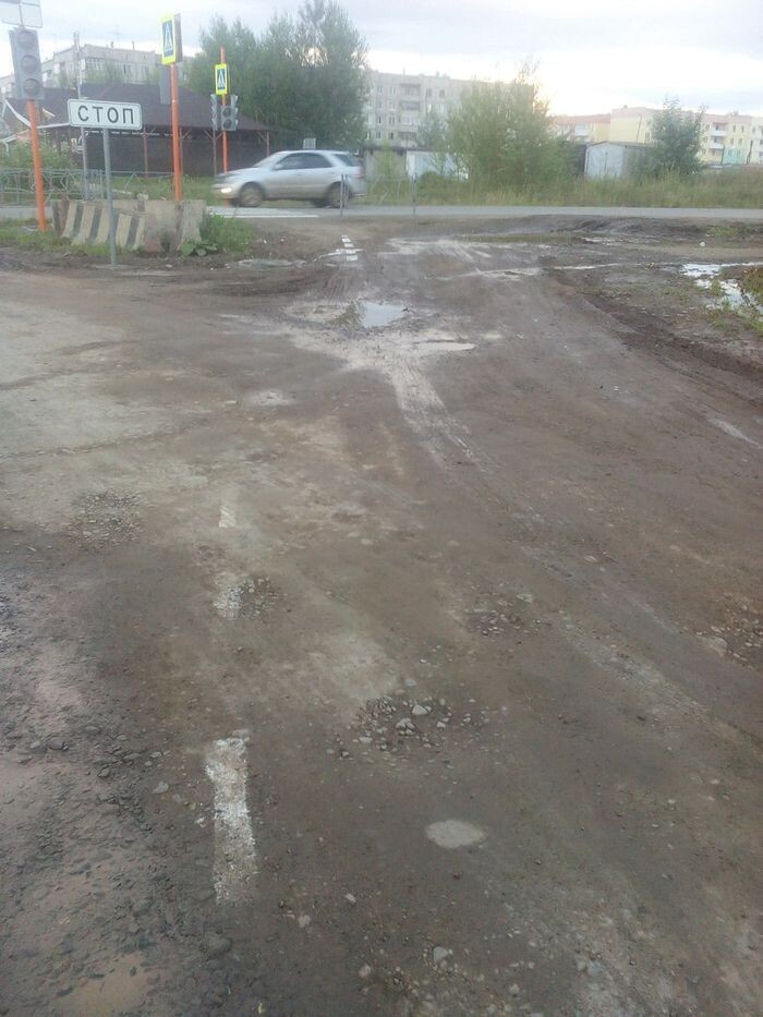 В Красноярском крае нанесли дорожную разметку на грязь