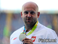 Польский метатель диска продаст медаль Олимпиады, чтобы помочь больному ребенку