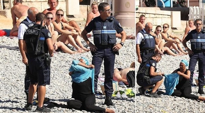 Полисмены заставили женщину снять буркини на пляже в Ницце