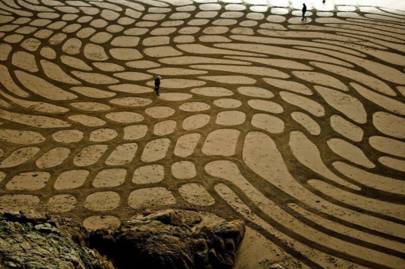 Недолговечное картины на песке Андреса Амадора
