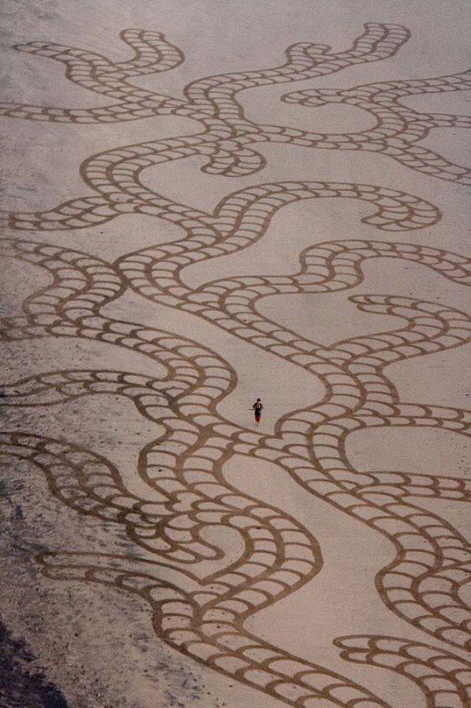 Недолговечное картины на песке Андреса Амадора