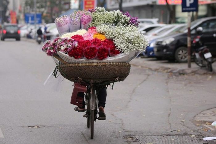 Продавец цветов из Азии