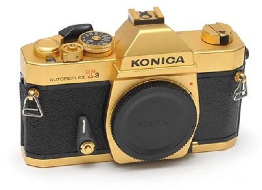 И совсем уже бюджетная "Konica Autoreflex Т3":