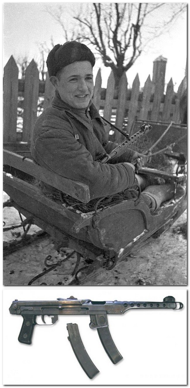 Молодой советский партизан в конных санях. Партизан вооружен пистолетом-пулеметом ППС-43.