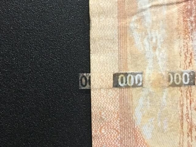 Фальшивая купюра номиналом 5000 рублей