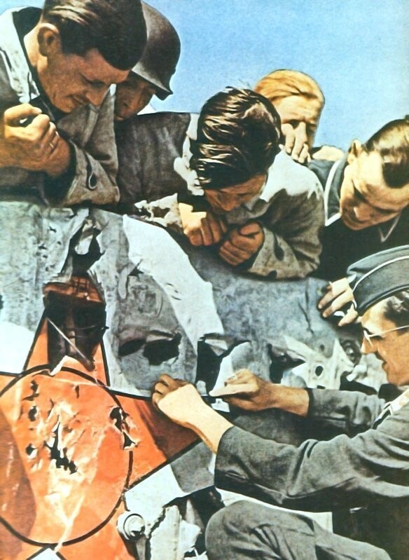 Немецкие зенитчики отдирают на сувениры куски обшивки сбитого ими советского истребителя И-153 «Чайка». Время съемки: 1941 