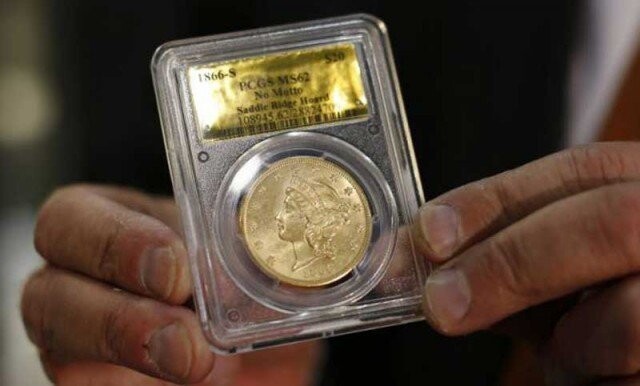 А вот реальный размер такой 20-долларовой монеты. Ее вес 34,5 грамма (золото 900 пробы ), диаметр 3.4 см