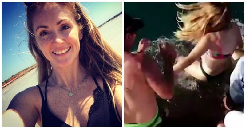 Акула утащила девушку в воду при попытке покормить ее с рук: видео