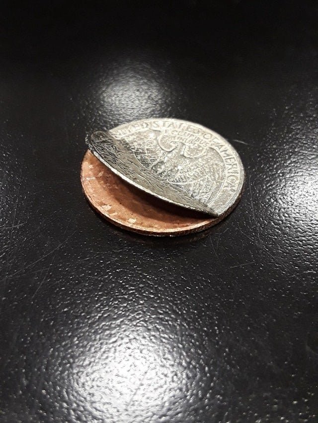 17. Монета в 25 центов