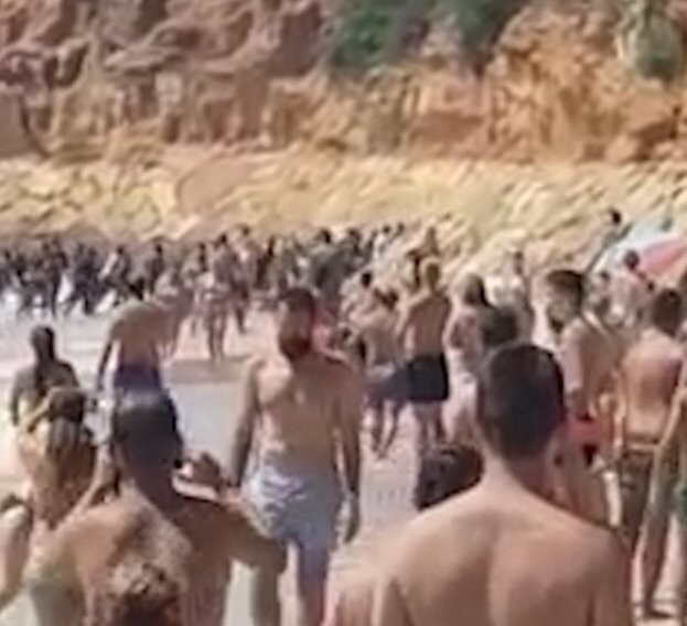 Мигранты взяли штурмом пляж шикарного отеля в Испании