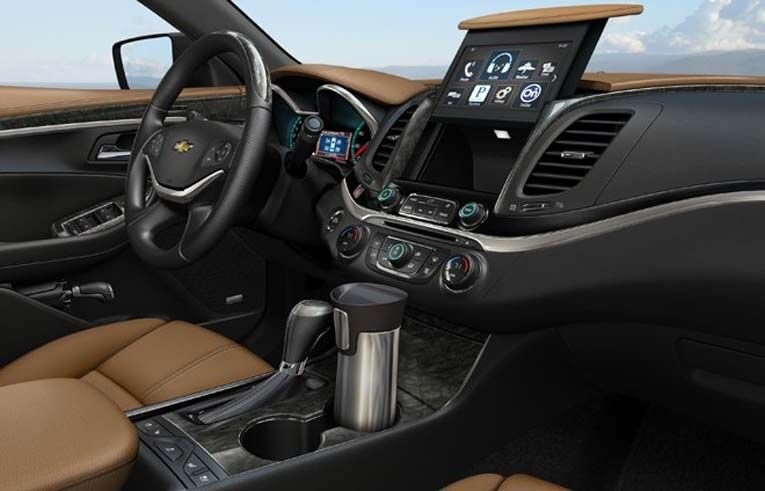 2014 Chevy Impala. Скрытое отделение для гаджетов Джеймса Бонда