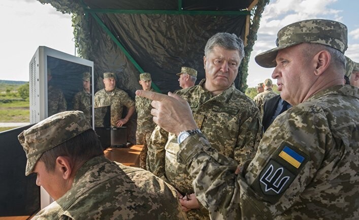 Чиновники Украины «согревают» народ дубинками и размышляют о войне с Россией