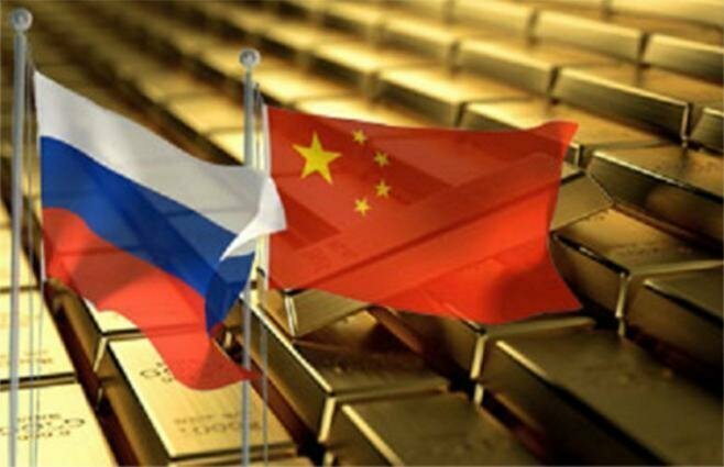 Россия и Китай скупают золото