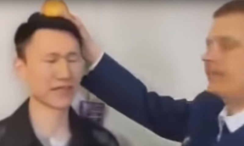 В бурятском ФСИН сняли корпоративный клип со стрельбой в яблоко на голове заключенного