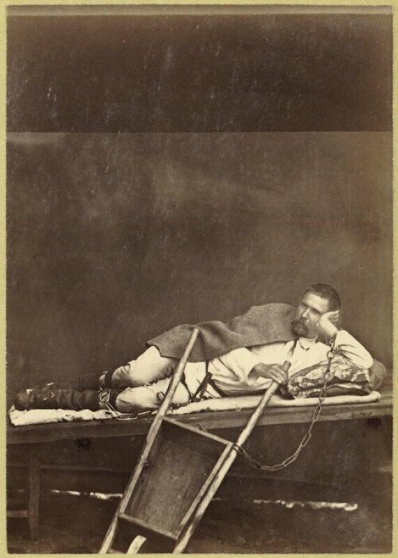 Прикованный к тачке заключенный на каторге в Нерчинске, 1891 год.