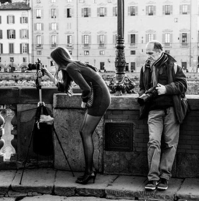 Человек с фотоаппаратом