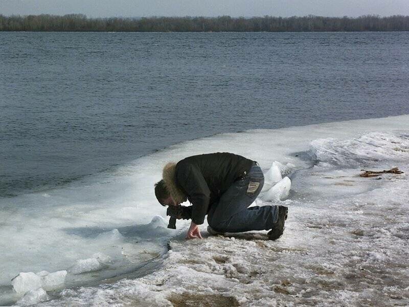 Человек с фотоаппаратом