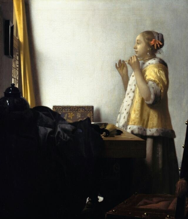 9. "Женщина с жемчужным ожерельем" (холст, масло, 1662)