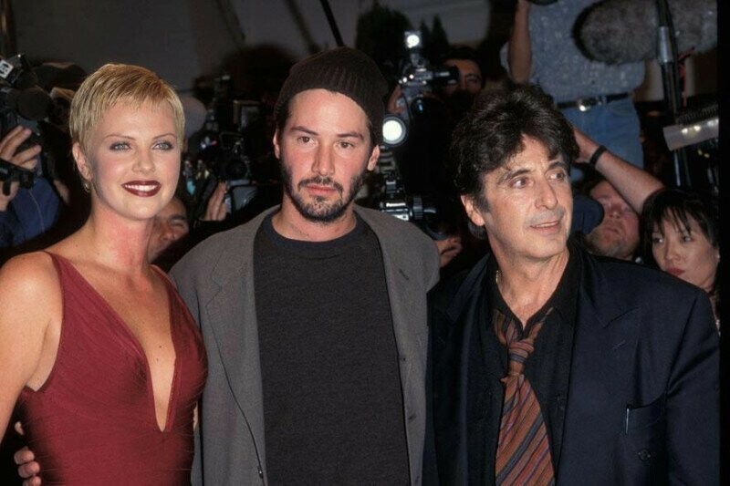 Шарлиз Терон,Киану Ривз и Аль Пачино на премьере фильма «Адвокат дьявола». 1997
