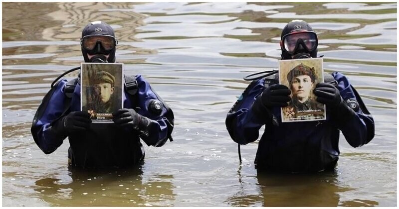 В Орле спасатели-водолазы прошли с портретами героев войны по дну реки