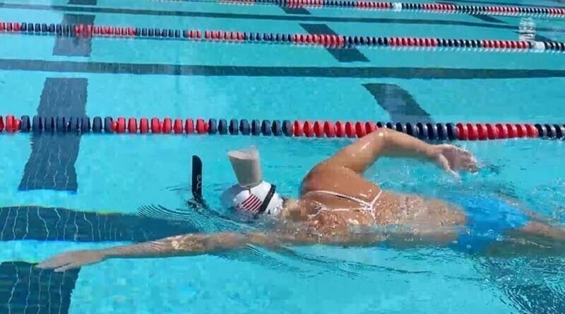 Пятикратная олимпийская чемпионка проплыла дистанцию со стаканом молока на голове
