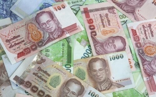Таиланд: наступать на деньги запрещено законом