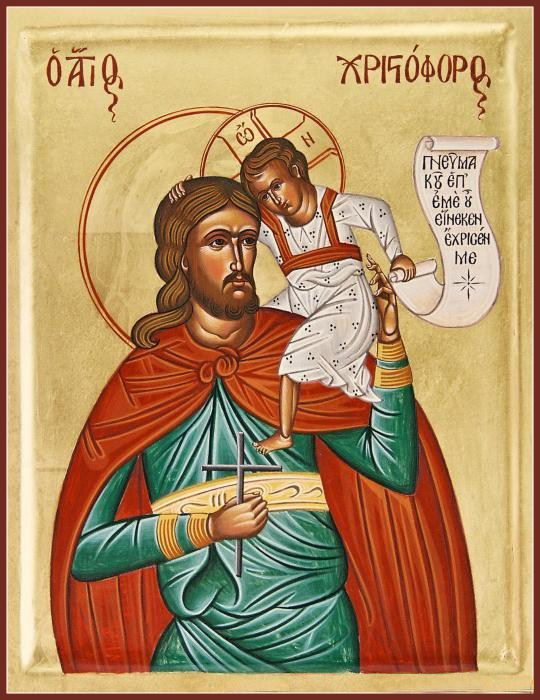 Христофор, покровитель путешественник5ов, с младенцем на руках. Младенец сам Христос, которого Христофор перенес через бурную реку. Святого часто изображают с песьей головой (псоглавец)