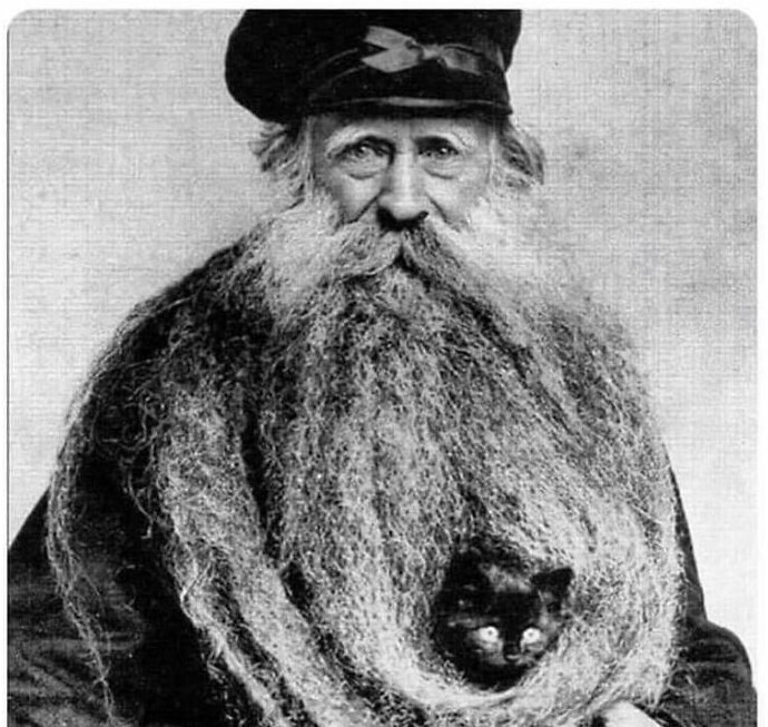 Луи Кулон - обладатель самой длинной 4-метровой бороды в мире, 1904г.