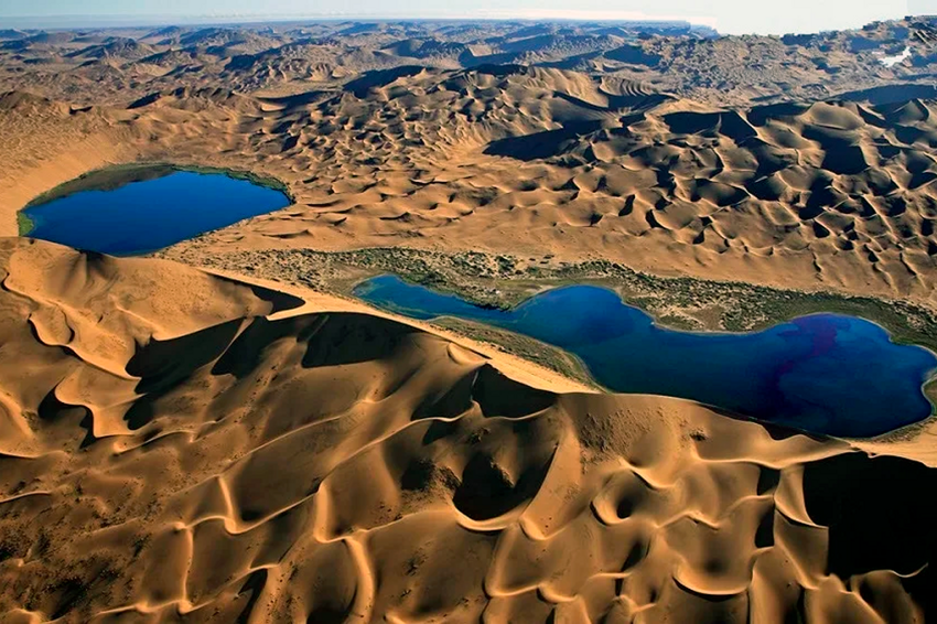 Какая толщина у песка в пустыне?