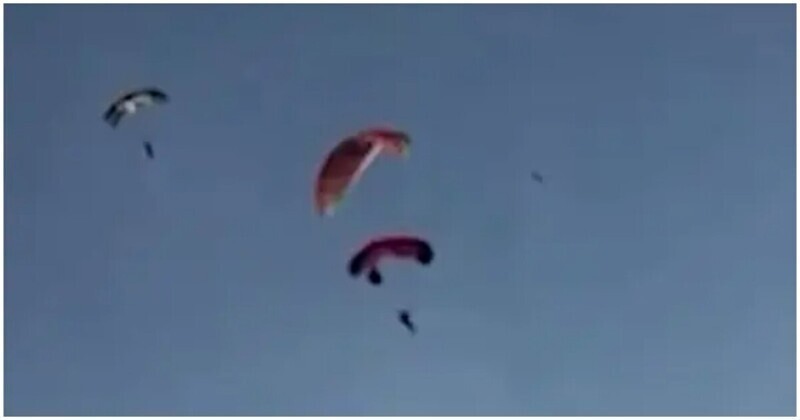 Столкновение парапланериста и парашютиста в небе попало на видео