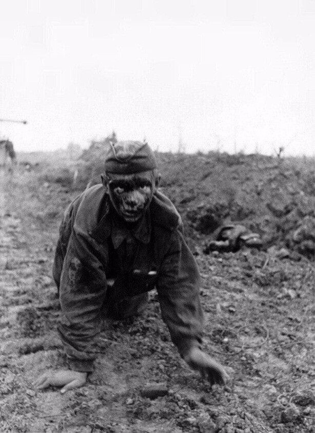 Лицо юного красноармейца после боя на Курской битве, 1943 год