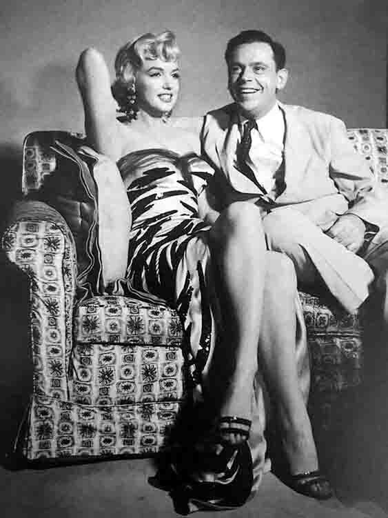 Мэрилин Монро и Том Юэлл на съемках американской кинокомедии "Зуд Седьмого Года", 1954 год