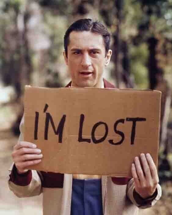 Роберт Де Ниро, 1977 год. На картонке: "Я потерялся"