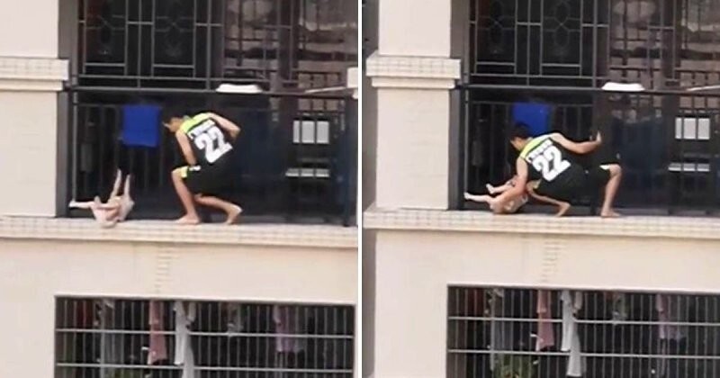 В Китае мужчина спас ребёнка, свисающего с балкона
