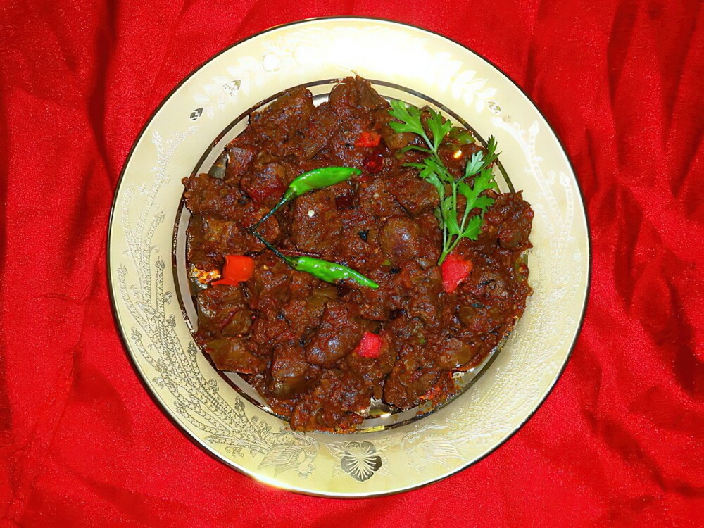 13. Пакистанское блюдо «катта-кат» (жареные яички, внутренности, почки и некоторые другие органы козла/барашка)