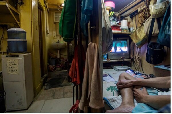 Жилищный коллапс Гонконга: как люди выживают на 2 квадратных метрах