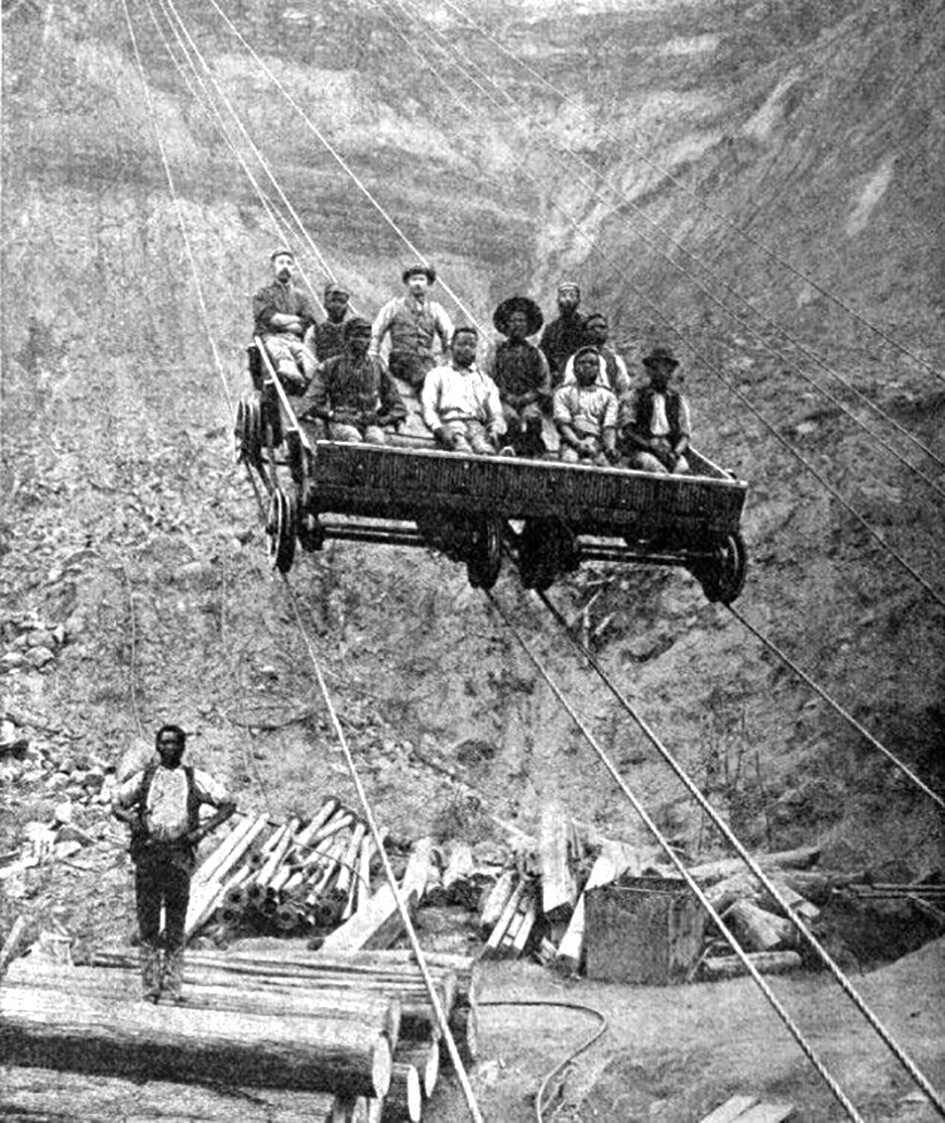 Шахтеры, использующие «воздушный трамвай», чтобы спуститься в алмазный рудник Кимберли в Южной Африке, 1880-е