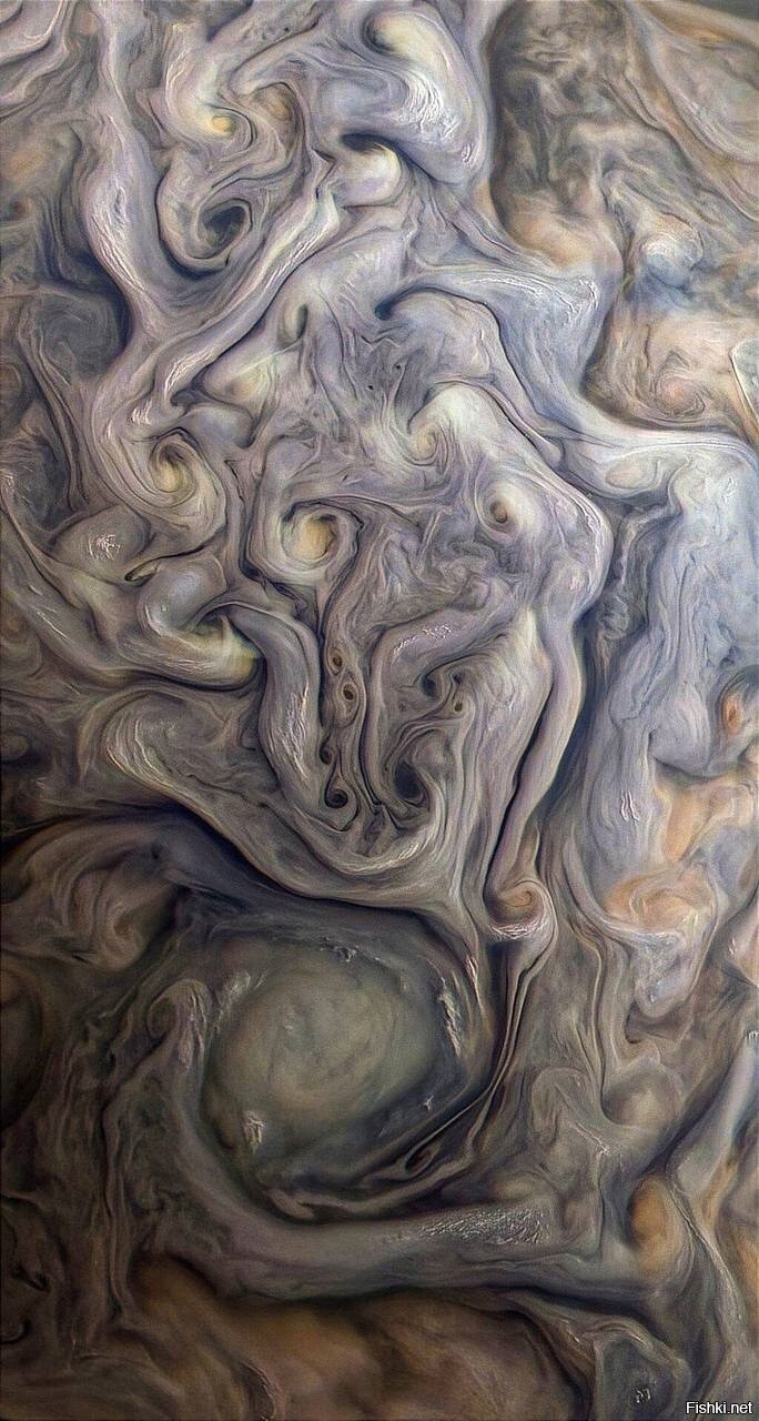 Этот снимок сделал аппарат Juno, когда находился над облачным слоем Юпитера в...