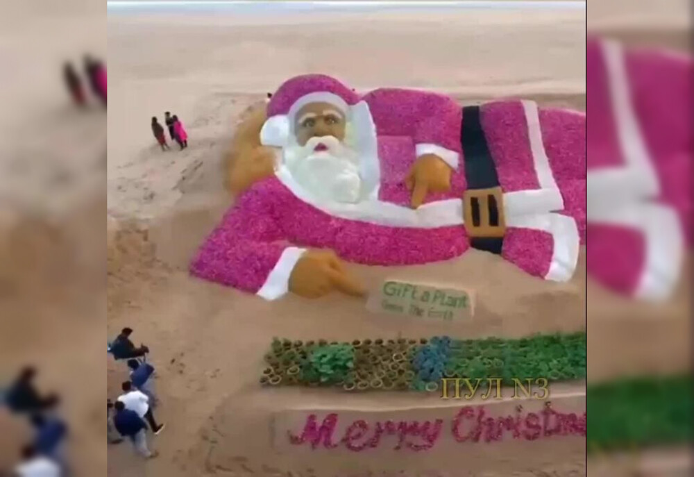 В Индии художник создал самого большого в мире Санта-Клауса из лука и песка
