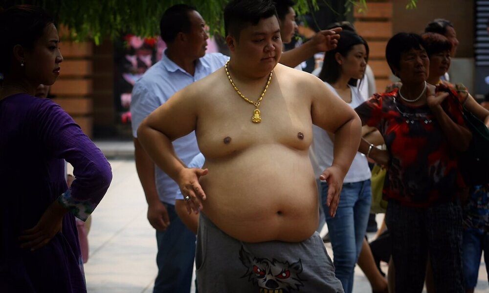 Почему китайцы любят ходить с голым животом