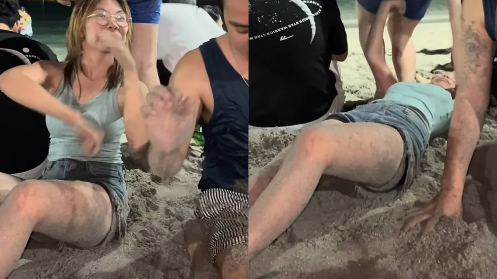 На пляже мужчина случайно сел на лицо девушке