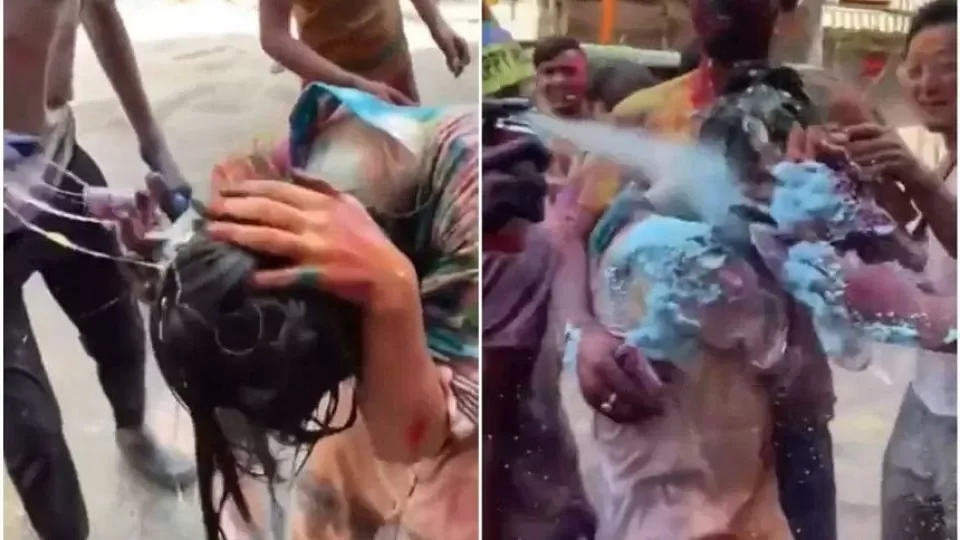 Японскую туристку облили краской на празднике Холи в Индии