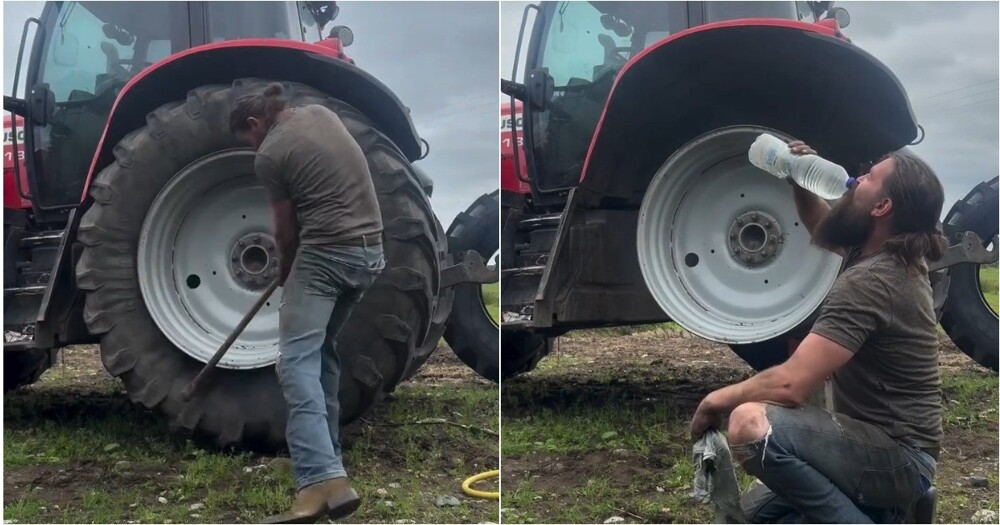 Мужчина в одиночку поменял колесо на тракторе