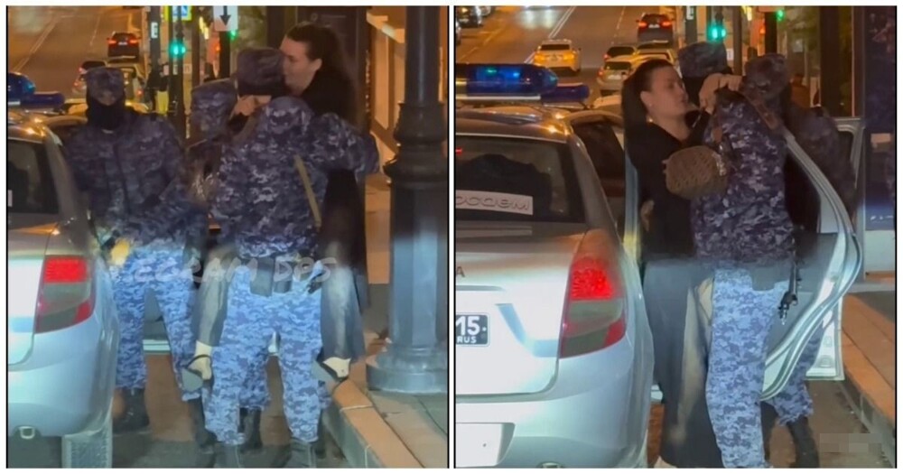 Девушка повисла на сотруднике Росгвардии